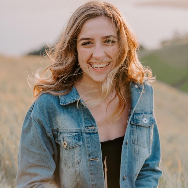 Avery Singh, Lead Design Curator at Scalable Operations Network, reviewing corporate floral arrangements